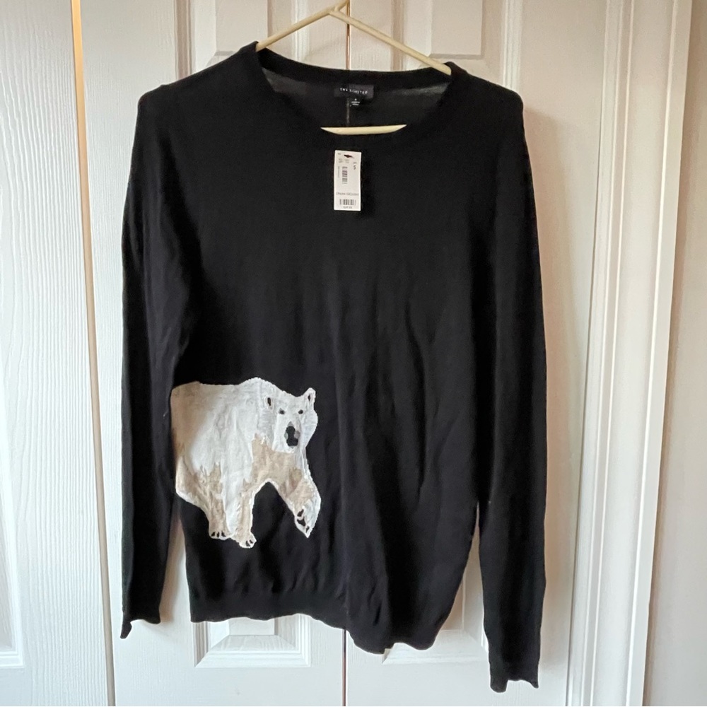 Black crewneck sweater with polar bear design
